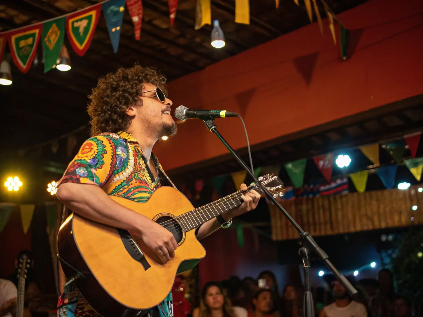A vibrant stage scene with a spotlight on a young musician playing a guitar, capturing the energy and passion of live performance.